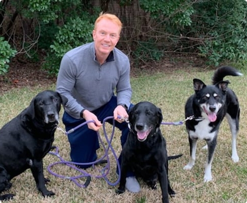 Doctor Huckabee with his dogs